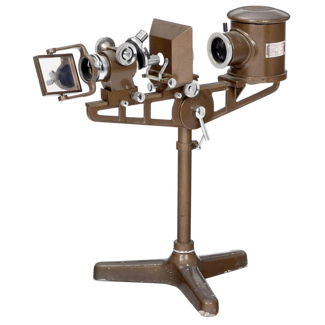 Precision Micro-Projector, c. 1935: Precision Micro-Projector, c. 1935 Flatters & Garnett Ltd., Manchester. No. 2292, for projection of specimen, nosepiece for 4 lenses, with rack-and-pinion focusing, electric functions not tested. - At