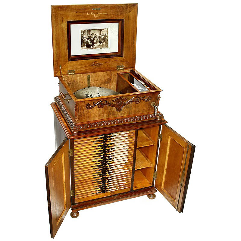 Disc Musical Box "Fortuna" with Cabinet, c. 1900: Disc Musical Box "Fortuna" with Cabinet, c. 1900 Manufactured by Heinrich Zimmermann, Leipzig. Model 280 Z (with zither), for 18 3/4 in. discs, 108 teeth in duplex comb (complete), with matching disc 
