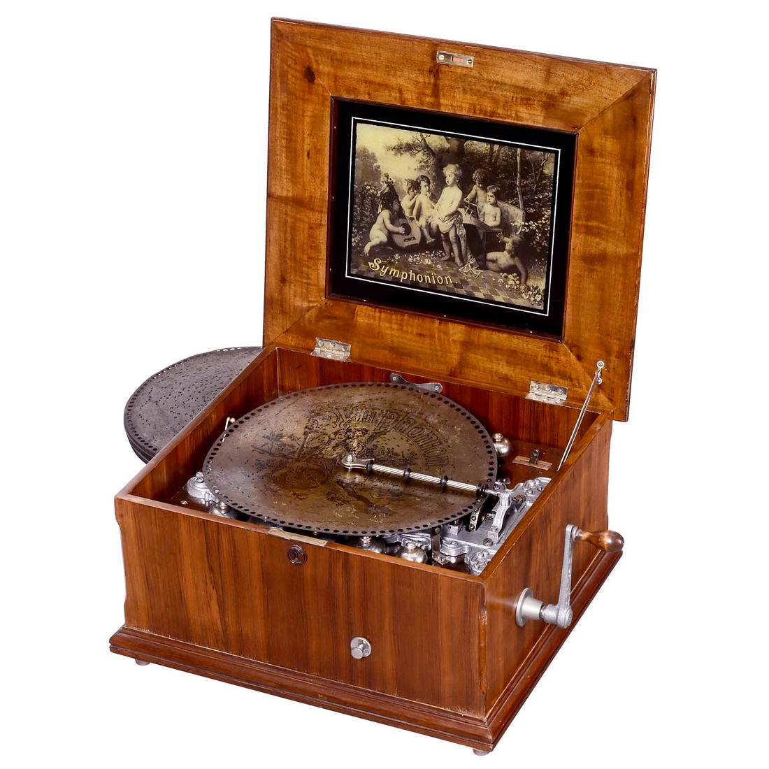 Symphonion No. 121GL Disc Musical Box, c. 1899: Symphonion No. 121GL Disc Musical Box, c. 1899 Symphonion Musikwerke, Leipzig. For 14 3/4-inch discs, with 10 horizontal saucer bells (optional), 120 teeth in duplex combs plus separate section to ope