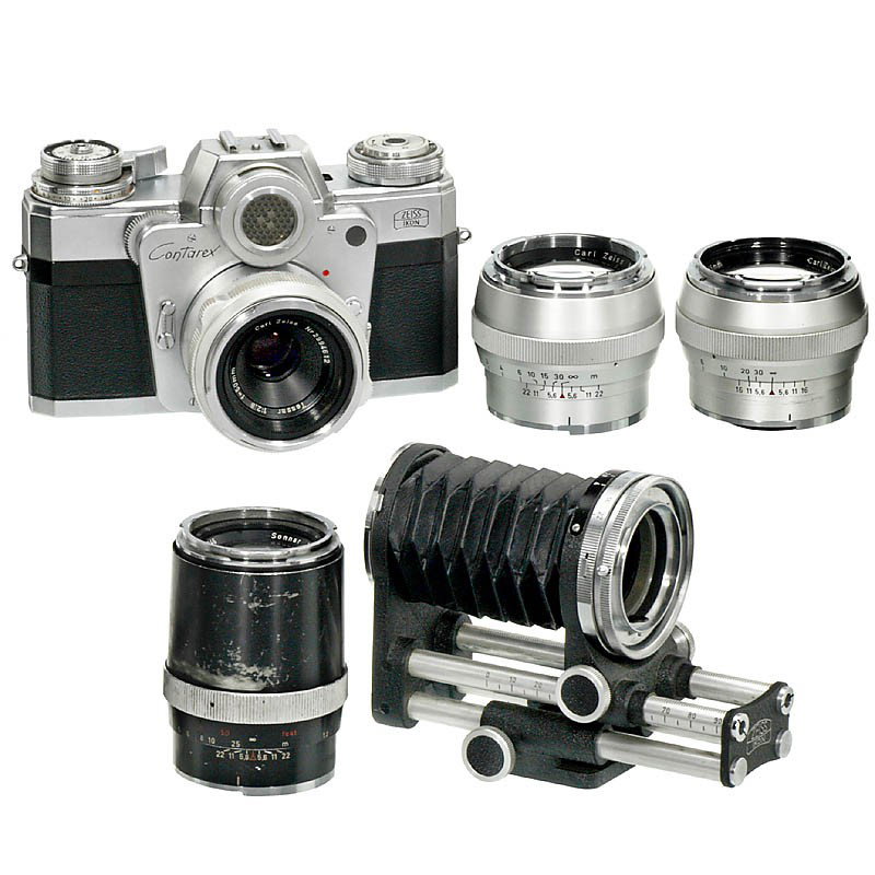 Contarex I Outfit, 1964: Contarex I Outfit, 1964 Zeiss Ikon, Stuttgart. 1) Contarex I "Bull's Eye", no. T 91702, second version (but without titeling facility). light meter working. With Tessar 2,8/50 mm, feet. (3/3) - 2) Pla