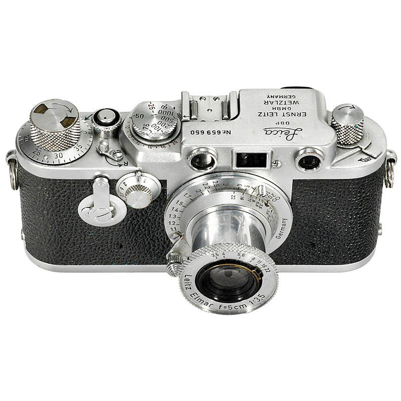Leica IIIf, 1953: Leica IIIf, 1953 Leitz, Wetzlar. No. 659650, red dial synchronization, with self-timer, the most sought-after Leica IIIf. With Elmar 3,5/5 cm, no. 944104. With cap and case. Leica IIIf, 1953 Leitz, We