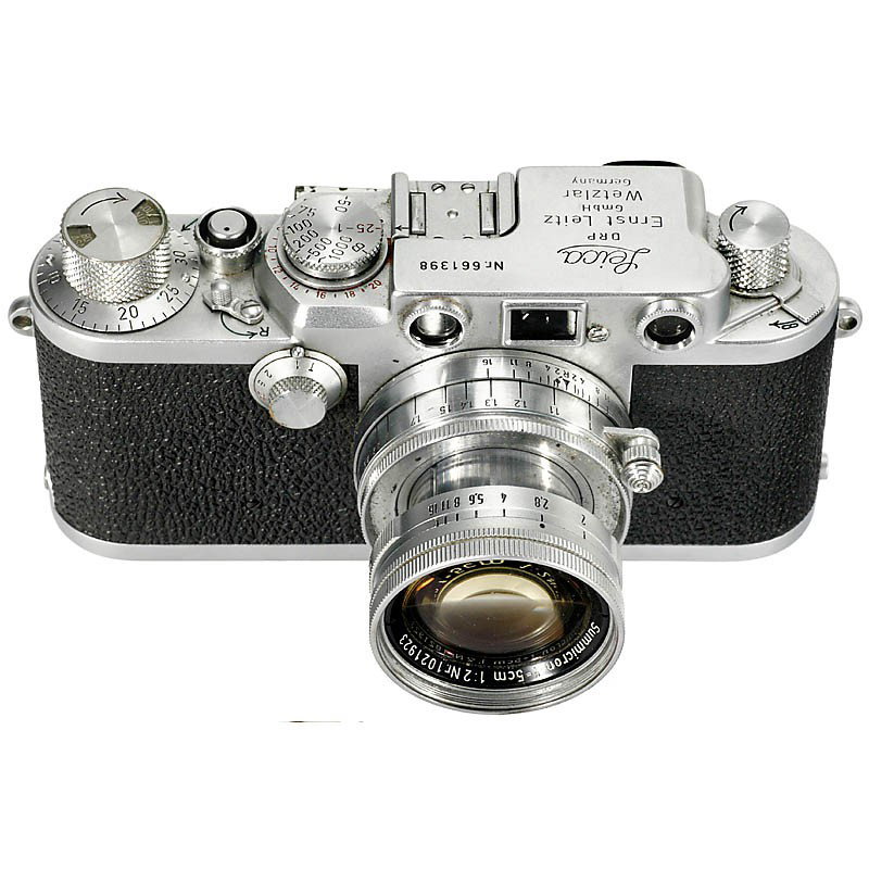 Leica IIIf, 1953: Leica IIIf, 1953 Leitz, Wetzlar. No. 661398, red dial synchronization, no self-timer, with Summicron 2/5 cm, no. 1021923, front lens in near mint condition, case. Leica IIIf, 1953 Leitz, Wetzlar. Nr. 