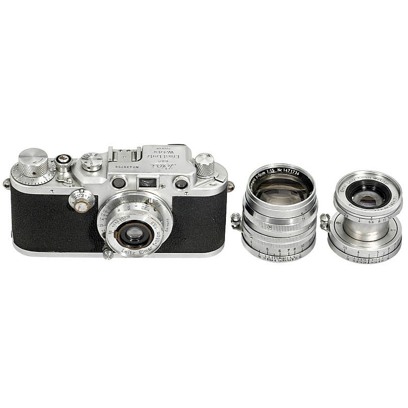 Leica IIIc and 3 Lenses, 1946: Leica IIIc and 3 Lenses, 1946 Leitz, Wetzlar. 1) Leica IIc, no. 439756, chrome, long shutter speeds stuck. - 2) Elmar 3,5/3,5 cm, no. 580785, meter. (3/3+) - 3) Elmar 2,8/5 cm, no. 1454171, feet, glas