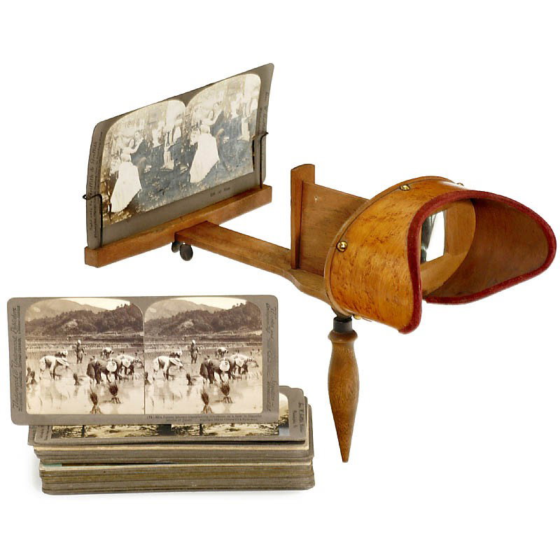 "The Vistascope" with 31 Stereo Cards, c. 1880: "The Vistascope" with 31 Stereo Cards, c. 1880 Griffith & Griffith, USA. System Holmes. With approx. 31 stereo cards 9 x 18 cm (various manufacturers and motifs). "The Vistascope" mit 31 Stereokarten,