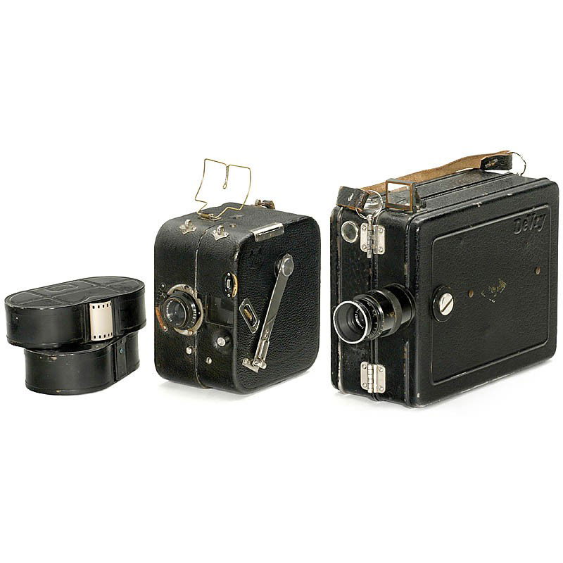 2 Movie Cameras for 35 mm, 1922-26: 2 Movie Cameras for 35 mm, 1922-26 1) ICA, Dresden. 35mm camera "Kinamo", c. 1922, type: 35 N 25, early 35mm movie camera for 25m cassettes, clockwork drive, 16 p/s, lens: Tessar 2,7/4 cm, with origin