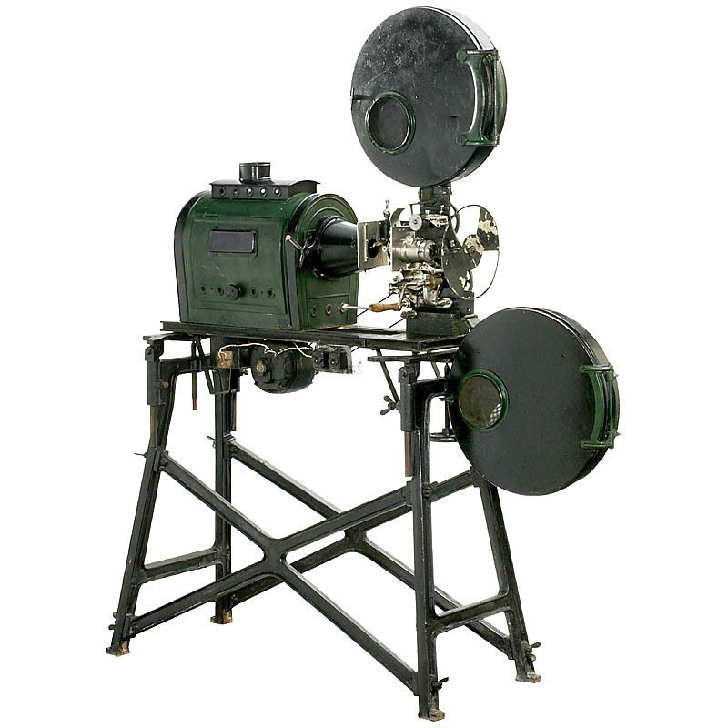 English 35mm Silent Movie Projector, c. 1915: English 35mm Silent Movie Projector, c. 1915 Manufactured by: "Moon, Birmingham". With Maltese Cross, fire protection drums for reels up to 900 m, nickel-plated gearwheels, handcrank or electric motor