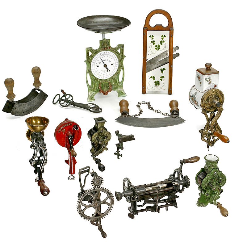 Collection of Kitchen Antiques: Collection of Kitchen Antiques 1) Art-Nouveau kitchen scale. - 2) Cast-iron vegetable peeler (handcrank-operated). - 3) 2 vegetable cutters. - 4) Hand mixer. - 5) 2 chopping knives. - 6) Vegetable sli