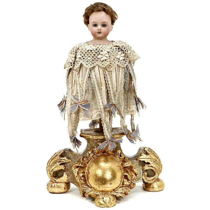 Musical "Marotte", c. 1900: Musical "Marotte", c. 1900 Germany, with bisque shoulderhead by Armand Marseille, fixed blue glass eyes, replacement new wig, turned wood handle and single-air cylinder movement that operates when dol