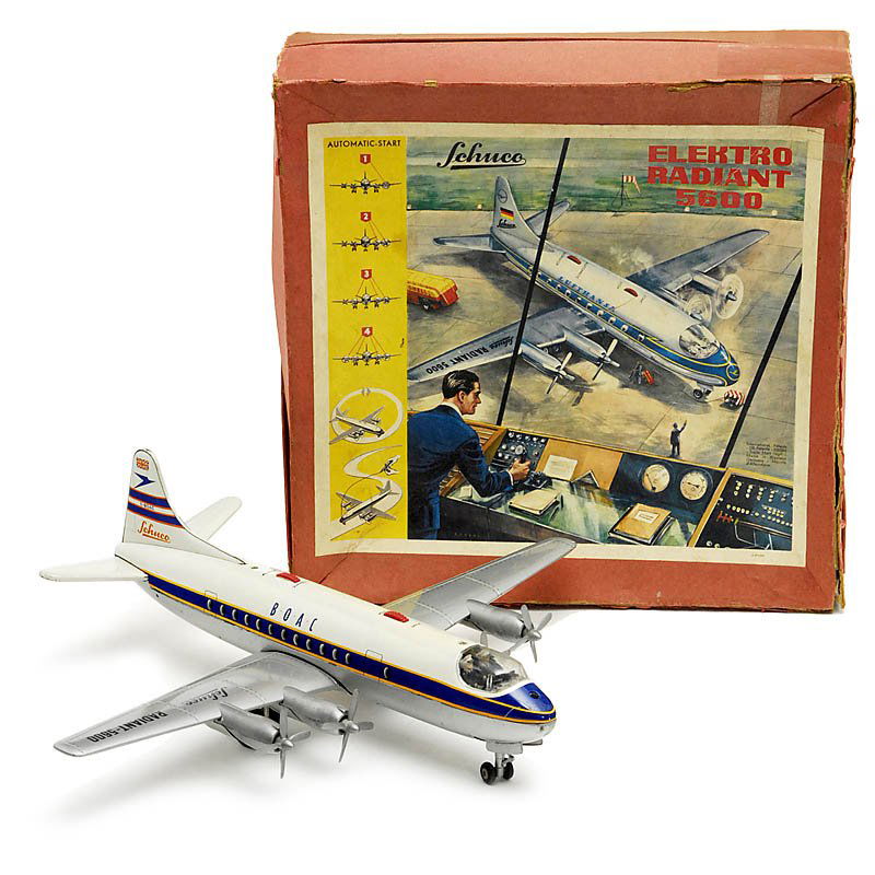 Toy Airplane "Schuco Elektro Radiant 5600": Toy Airplane "Schuco Elektro Radiant 5600" Rare "B.O.A.C." version, lithographed tin, electric functions working, length 16 1/2 in., original box. Flugzeug "Schuco Elektro Radiant 5600" Seltene "B.O.A