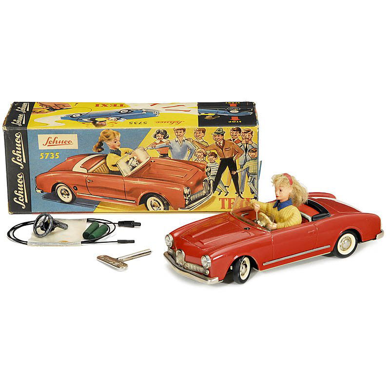 Tin Toy Car "Schuco Texi 5735", c. 1965: Tin Toy Car "Schuco Texi 5735", c. 1965 Model Alfa Romeo, painted tin with lithographed interior, clockwork, steerable with remote control, length 10 in., very good condition, working, original box. S