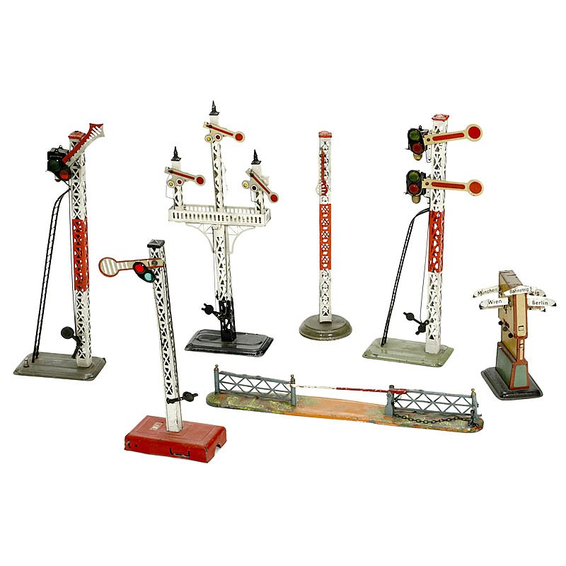 Signals and further Accessories "Bing" Gauge 0, c.: Signals and further Accessories "Bing" Gauge 0, c. 1930 5 different signals, some with electric lights; 1 indicator and 1 barrier. Signale und weiteres Zubehör "Bing" Spur 0, um 1930 5 verschiedene S