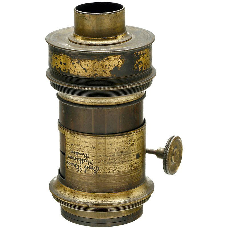 Landscape Lens "E. Busch", c. 1865: Landscape Lens "E. Busch", c. 1865 "Emil Busch, Rathenow, Preussen", Petzval type, approx. 35 cm focal length, brass lens, for waterhouse stop, with lens hood and lens cap. Height of the lens with cap