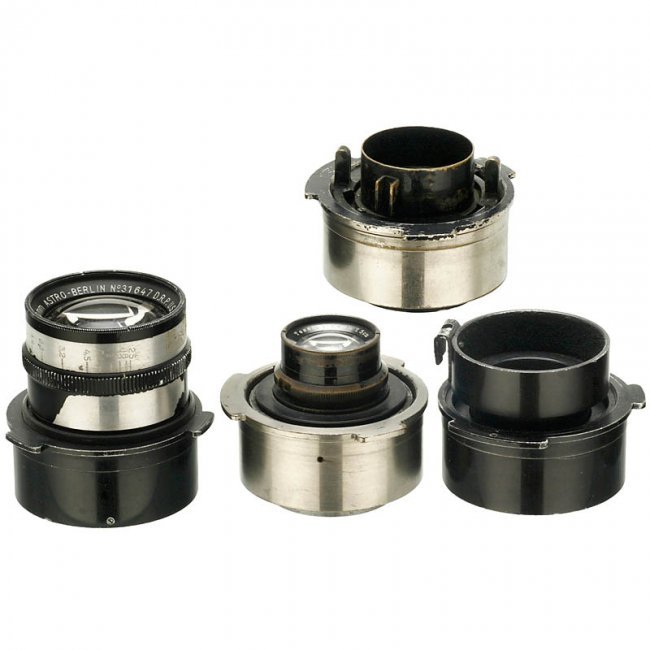 4 Movie Lenses, c. 1935: 4 Movie Lenses, c. 1935 Camera mount: Askania Z. 1) Astro Pan-Tachar 2,3/50 mm. - 2) Astro Pan Tachar 1,8/50 mm. - 3) Astro Pan-Tachar 1,8/75 mm. - And: 4) Zeiss Jena Tessar 3,5/75 mm. - Glass minimal