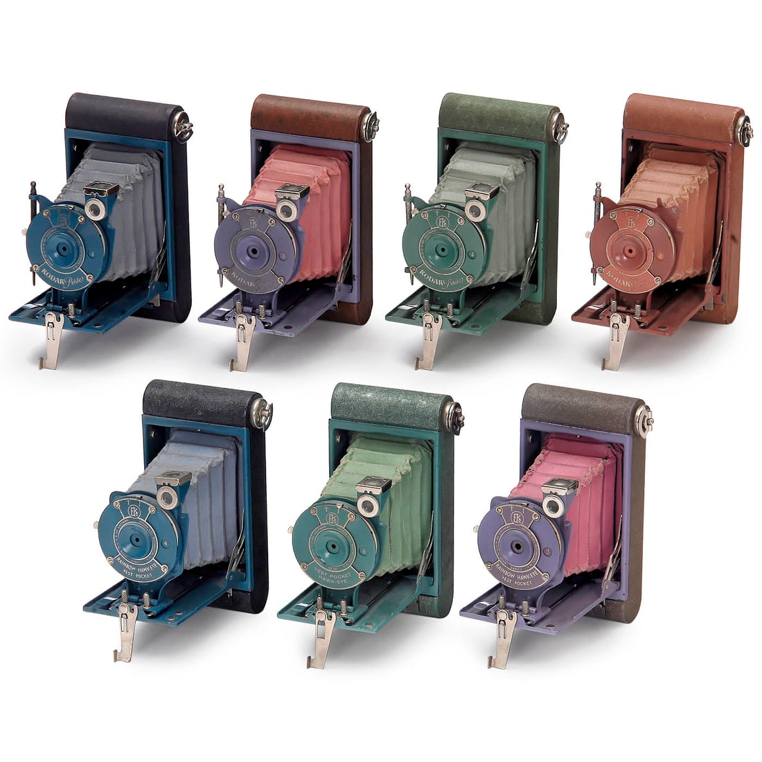 4 Kodak Petite, 2 Rainbow Hawk-Eye and Vest-Pocket Hawk-Eye Cameras: 4 Kodak Petite, 2 Rainbow Hawk-Eye and Vest-Pocket Hawk-Eye Cameras Kodak, USA. 1-4) Kodak Petite for 127-rollfilm and Autographic back in the color versions: light green/light green bellows, violet a