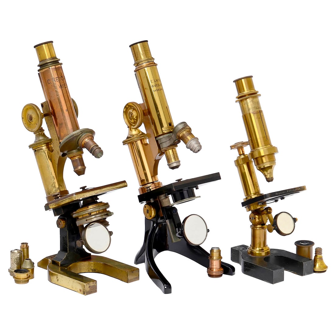 3 Brass Microscopes: 3 Brass Microscopes 1) C. Reichert, Vienna, c. 1895, 90˚ tilting tripod, double mirror, substage height-adjustable Abbe condenser with iris diaphragm, sliding tube, coarse and fine adjustment, 2 