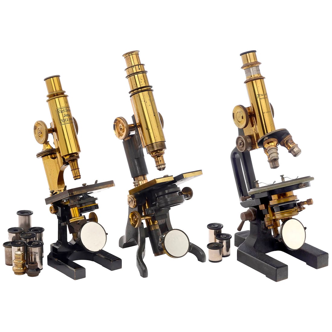 3 Brass Compound Microscopes: 3 Brass Compound Microscopes 1) Marked on the tube: "Busch, Rathenow", c. 1910. No. 19007, original lacquered brass, black-painted cast-iron horseshoe foot, double mirror, substage condenser and iris 