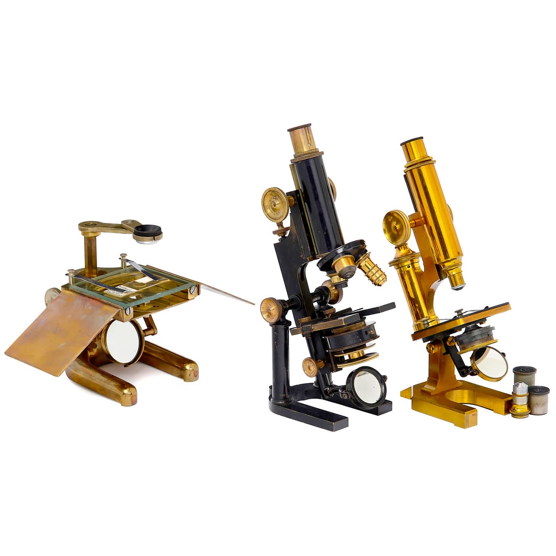 3 English Microscopes: 3 English Microscopes 1) Dissecting microscope, c. 1910, Prior, London, no. 12082, brass, plane mirror, double-jointed arm for the lens, rack-and-pinion focussing, 1 lens (x 10), in matching mahogany