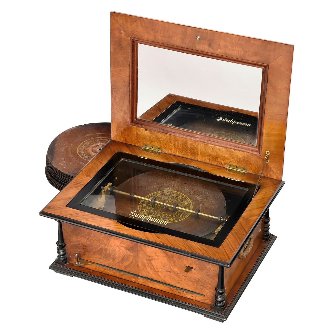Symphonion Style 25 Disc Musical Box, c. 1900: Symphonion Style 25 Disc Musical Box, c. 1900 Symphonion Musikwerke, Leipzig. For 11 ¾ in. discs, with 84 teeth in double comb (complete), lever-wind mechanism, walnut case and brass handles, 1