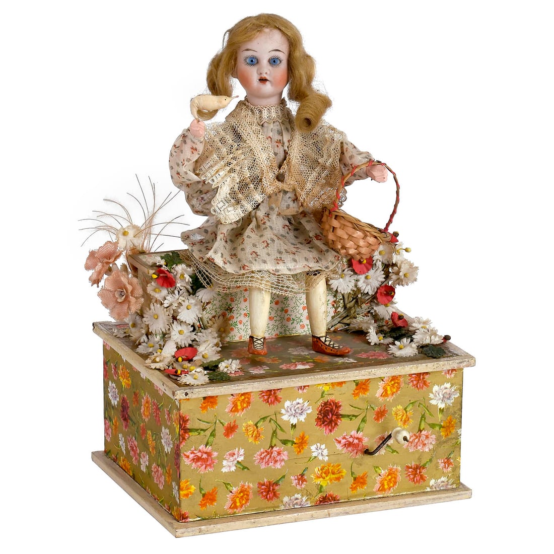 Musical Manivelle Automaton, 20th Century: Musical Manivelle Automaton, 20th Century Probably Sonneberg, Germany, depicting a girl with a bird, with bisque head by Armand Marseille incised "AM 90 Dep, Germany", open mouth, fixed bright-blue gl