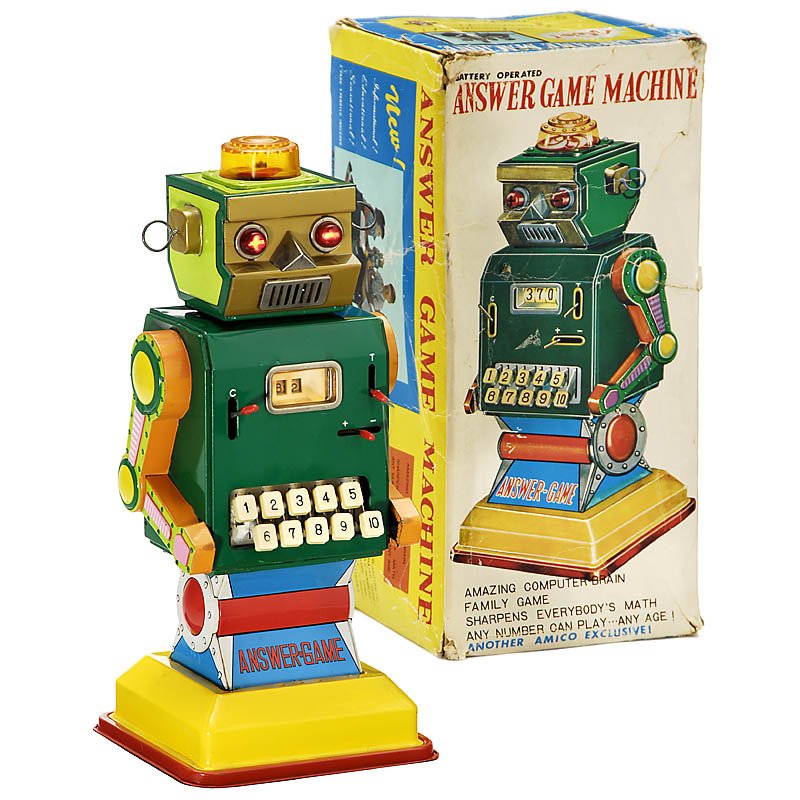 Calculating Robot "Answer Game", c. 1963: Calculating Robot "Answer Game", c. 1963 This robot is a fascinating working adding machine. He adds and substracts, his eyes blink, and a disc revolves in his head, 14 in. high! Manufactured by Ischi