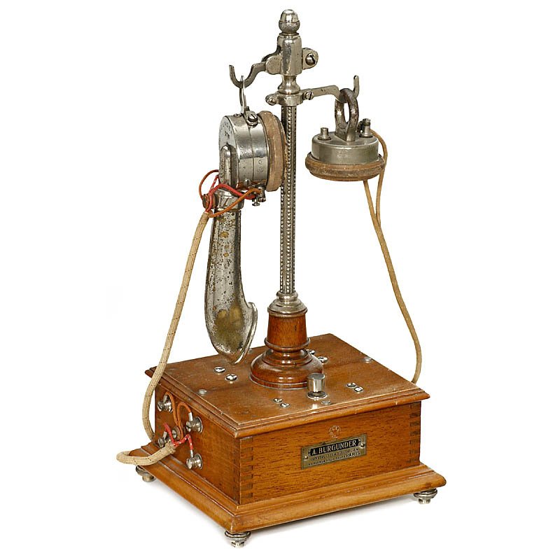 French Desk Telephone "A. Burgunder", c. 1917: French Desk Telephone "A. Burgunder", c. 1917 Marked on the base, handset and second hearing device "A. Burgunder, Paris", walnut case with nickel-plated pillar, height 15 3/4 in. - Very rare! Franzö