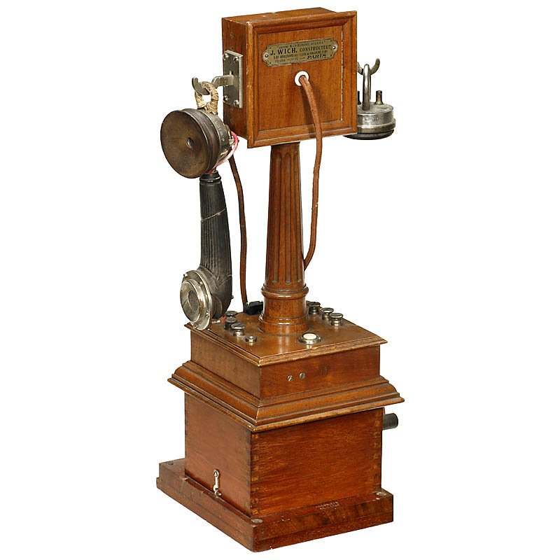 French Desk Telephone "C. Wich", c. 1918: French Desk Telephone "C. Wich", c. 1918 System "Wich-Deckert", handset marked: "C. Wich, Paris", second hearing device by "S.F.T.", Berliner system, walnut case, on base with crank inductor coil by "