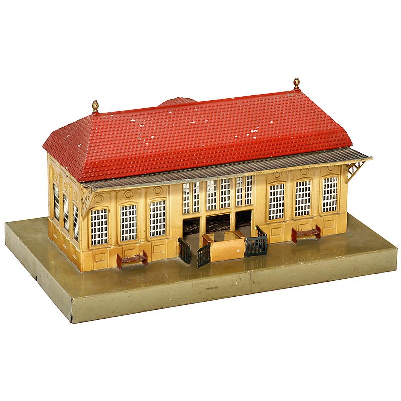 "Märklin" City Station, No. 2034B, Gauge 0, c. 193: "Märklin" City Station, No. 2034B, Gauge 0, c. 1930 Hand-painted tin, electric lighting, with canopies and platform doors, size 16 1/2 x 10 x 9 in. Großstadt-Bahnhof "Märklin" Nr. 2034B Spur 0, um 