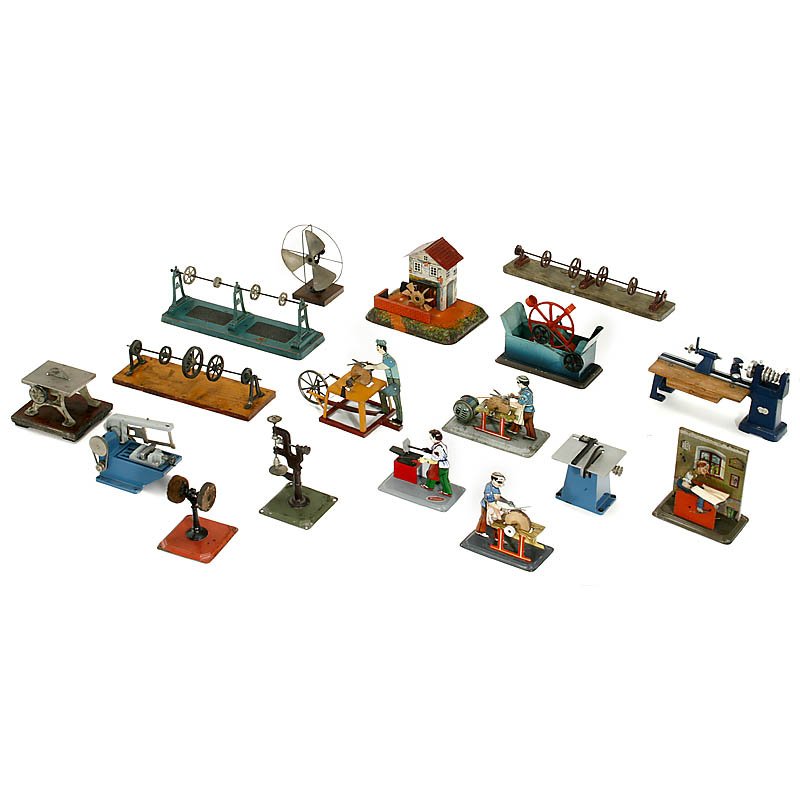 Lot Steam Toys and Workshop Transmissions, from 19: Lot Steam Toys and Workshop Transmissions, from 1920 1) Bing: Dredge, drilling machine, fan, tailor, trip hammer and polishing wheel. - 2) Arnold: 2 scissors grinders. - 3) Schoenner: Saw. - 4) Wilesc