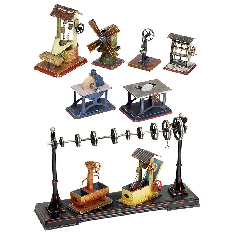 High Workshop Transmission and Steam Toys "Doll",: High Workshop Transmission and Steam Toys "Doll", from 1925 1) Transmission no. 650/2, width 20 1/2 in. - And: 2) Steam toys: Trip hammer, draw well, saw, 2 dredges, punch press, grindstone and windmi