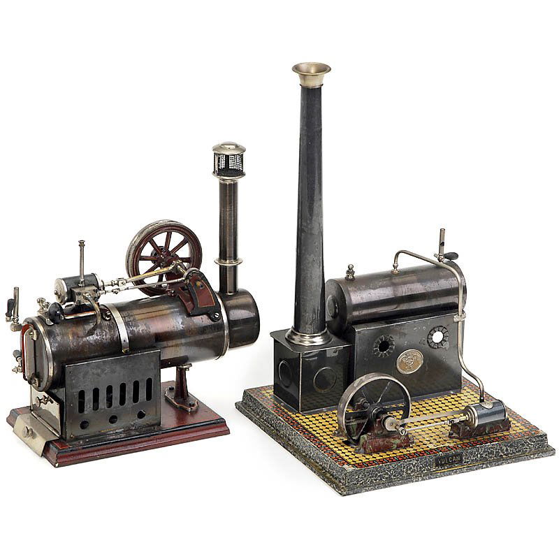 2 Steam Engines "Falk" and "Plank", c. 1925: 2 Steam Engines "Falk" and "Plank", c. 1925 1) Stationary steam plant "Falk" (456/0), flywheel Ø 3 in., cast-metal base, size 9 x 4 3/4 x 10 5/8 in., with vaporizing burner. - And: 2) Horizontal stea