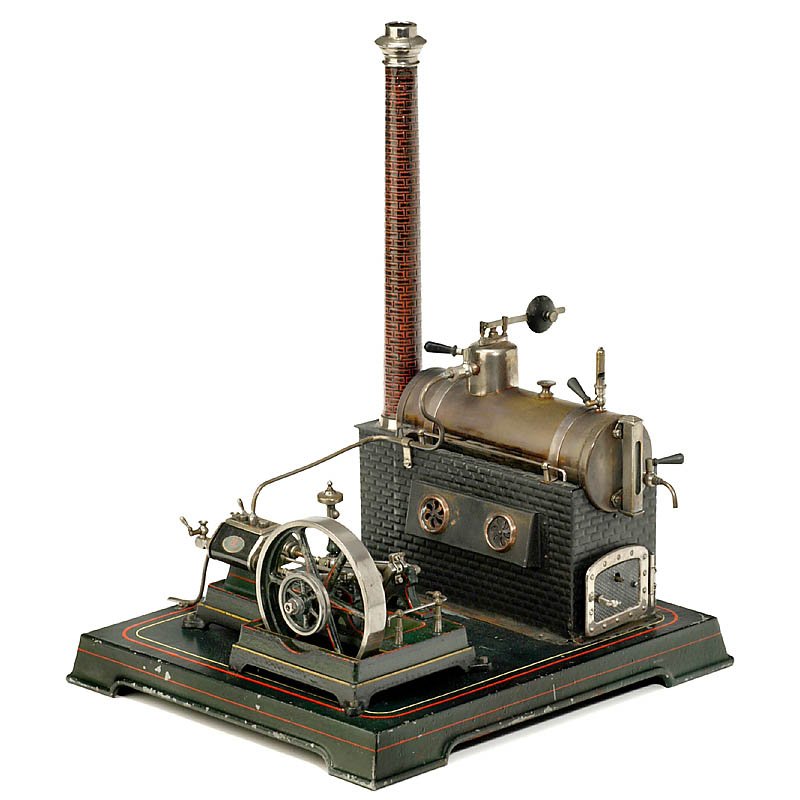 Horizontal Steam Engine by Doll (365/1), c. 1930: Horizontal Steam Engine by Doll (365/1), c. 1930 With double cylinder! Flywheel Ø 4 in., boiler Ø 2 1/2 in., overall size: 12 1/2 x 11 x 16 1/6 in., complete with vaporizing burner and all fittings.