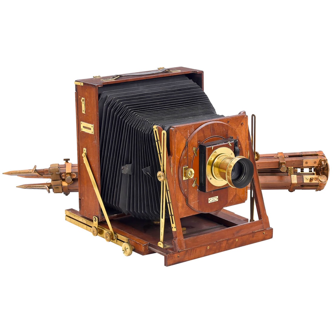 The Sanderson Field Camera, 1893 onwards: The Sanderson Field Camera, 1893 onwards G. Houghton & Son, London. 10 x 12 in., mahogany with brass fittings, black bellows (split), camera front with engraving "Sanderson's Patent" and "473", focusi