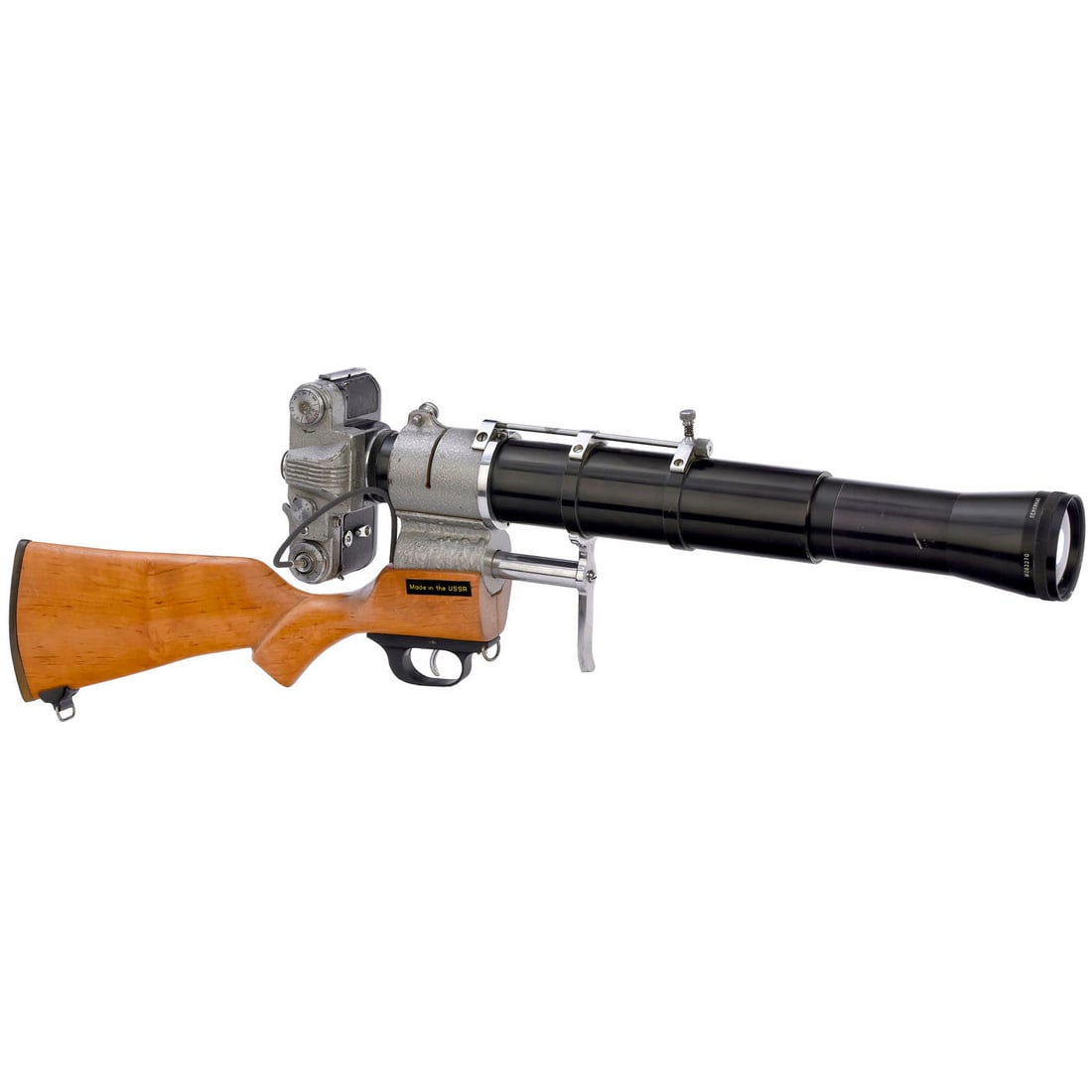 KMZ Crystal Rifle Camera for the Hunt for Unknown Objects, c. 1963: KMZ Crystal Rifle Camera for the Hunt for Unknown Objects, c. 1963 KMZ, USSR. Crystal No. 61022994, SLR for 24 x 36 mm, with grey hammered paint effect, rifle mount in corresponding finish and an indi