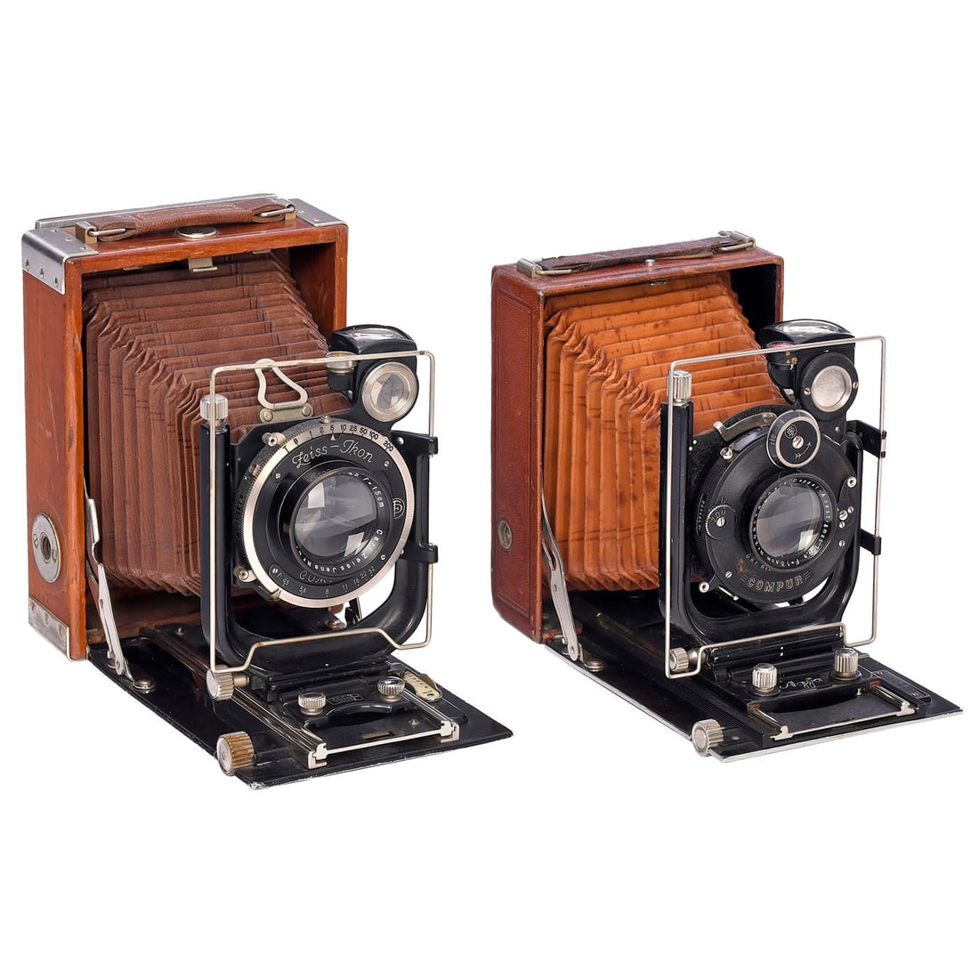 Isolar Luxus and Tropen-Adoro Cameras: Isolar Luxus and Tropen-Adoro Cameras Both 9 x 12 cm, shutters working. 1) Agfa, Munich. Isolar Luxus, brown leather and bellows, changeable lens Agfa Doppel-Anastigmat 4.5/13.5 cm, with diopter and o