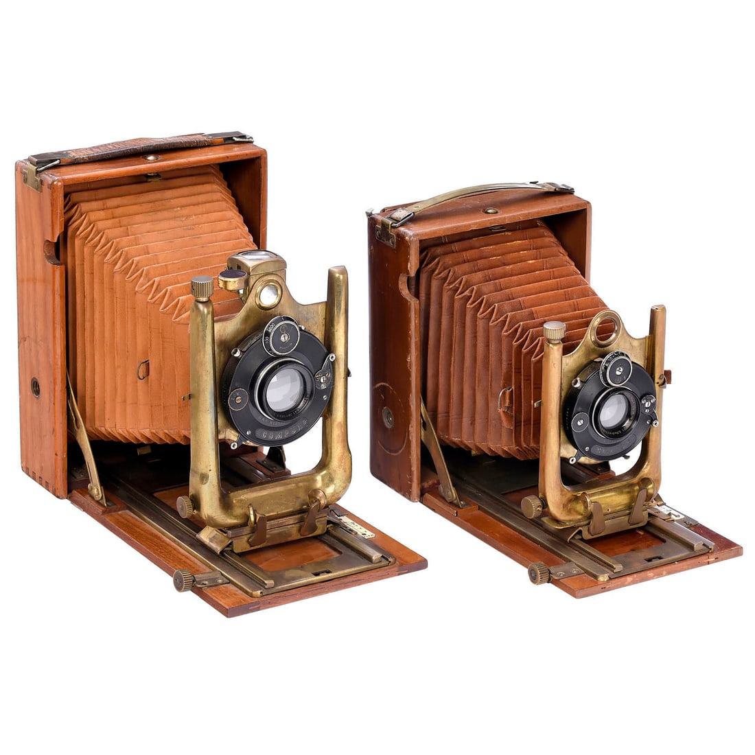 2 Steinheil Tropical Folding Cameras: 2 Steinheil Tropical Folding Cameras Steinheil, Munich. Both cameras of the same design, teak with brass fittings, double extension, light-brown bellows and original ground-glass back. 1) For 10 x 15