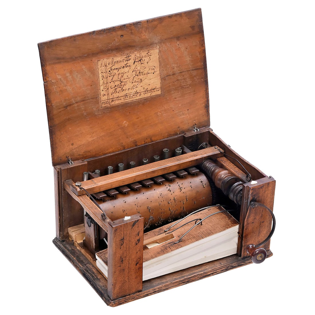 Miniature Serinette Barrel Organ by Johan Arnold, c. 1780: Miniature Serinette Barrel Organ by Johan Arnold, c. 1780 Germany. Playing 6 airs, with hand-turned nine-note mechanism, metal pipes, walnut case, handwritten original tune-sheet and maker's label in