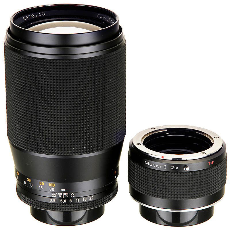 Tele-Tessar T 3,5/200 mm and Mutar I for Contax RTS: Tele-Tessar T 3,5/200 mm and Mutar I for Contax RTS Carl Zeiss, Oberkochen, "Made in West Germany", 2 caps. Like new! - And: Carl Zeiss Mutar I 2x. "Made in Japan". Like new! Tele-Tessar T 3,5/200 mm