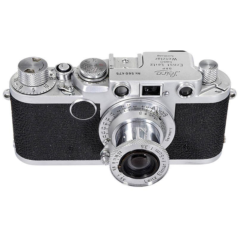 Leica IIIc, 1951: Leica IIIc, 1951 Leitz, Wetzlar. No. 560475, Leica Ic converted to IIIc, black curtain, red-dial synchronization. With Elmar 3,5/5 cm, no. 989936, lens cap. Leica IIIc, 1951 Leitz, Wetzlar. Nr. 560475