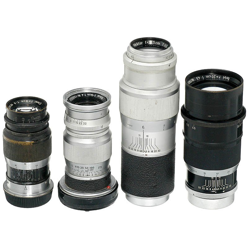 3 Leica Screw-Mount Lenses and 1 M-Mount Lens: 3 Leica Screw-Mount Lenses and 1 M-Mount Lens Leitz, Wetzlar. 1) Elmar 4/9 cm, no. 320843, black. (3-/3) - 2) Hektor 4,5/13,5 cm, no. 851659, chrome. (3/3+) - 3) Telyt 4,5/20 cm, no. 768592. (3/2) - A