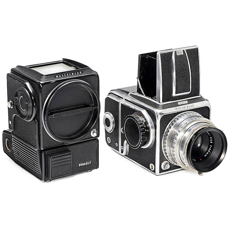 Hasselblad 1000F and 500ELX: Hasselblad 1000F and 500ELX Hasselblad, Sweden. 1) Hasselblad 1000F, 1954, no. CI15521, with Tessar 2,8/80 mm, waist-level viewfinder and magazine, shutter stuck. (3/4-) - And: 2) Hasselblad 500ELX bo