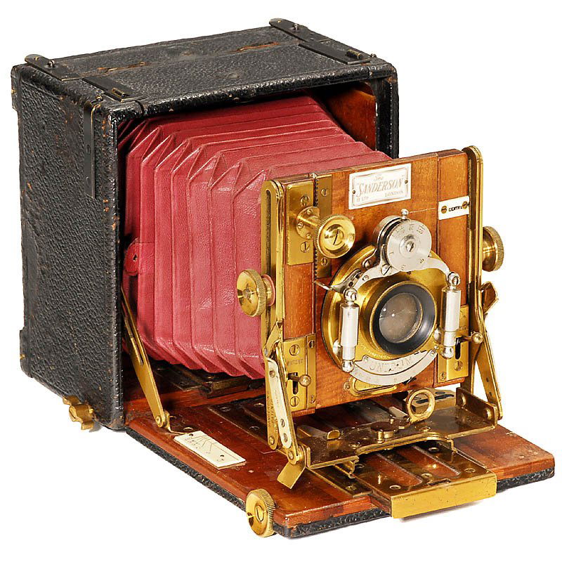 Sanderson "Regular", c. 1896: Sanderson "Regular", c. 1896 Sanderson Camera Works, England. Size 3 1/4 x 4 1/4 in., red bellows, finely polished wood, leathered, brass fittings, viewfinder missing, unmarked brass lens, Unicum shut