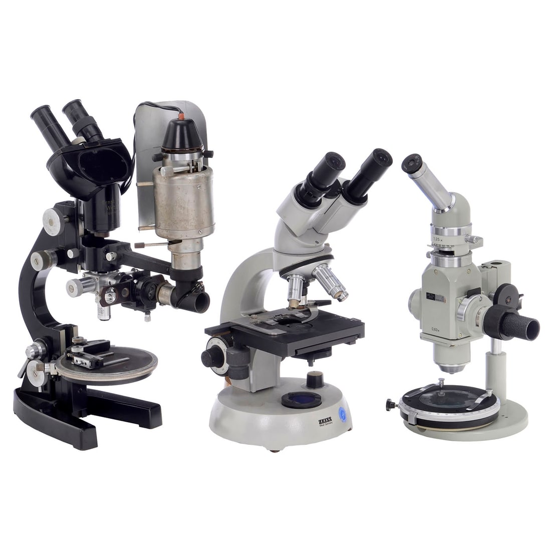 3 Microscopes: 3 Microscopes 1) Binocular reflected-light polarisation microscope, Ernst Leitz, Wetzlar; c. 1960, height 43 cm. – 2) Binocular microscope KF2, Carl Zeiss, West Germany, c. 1985, quadruple revol