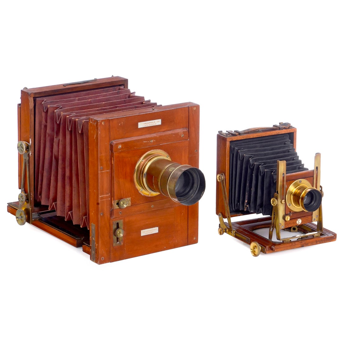 Lancaster Travel Camera "International Patent" and Wray "Hand Camera": Lancaster Travel Camera "International Patent" and Wray "Hand Camera" 1) Lancaster, Birmingham, England. International Patent, 1885. Travel camera for dry plate format 16 x 12 cm (1/2 plate), Mahogany