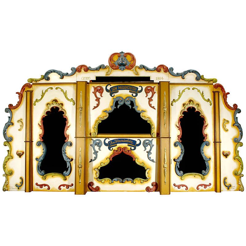 Facade of a Very Large Fairground Organ: Facade of a Very Large Fairground Organ Wood, with carved ornaments, size 200 x 111 in. Große Front einer Jahrmarktorgel Holz, mit geschnitzten Verzierungen, Maße 500 x 282 cm.