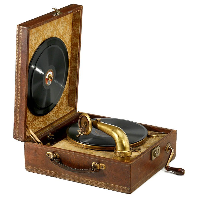"Pathé" Portable Gramophone: Pathé Portable Gramophone Luxury French disc phonograph, marked "Olophone Pathé", with embossed leather-covered wooden case and gilt fittings, working, with 4 discs. Koffergrammophon "Pathé" Franz�