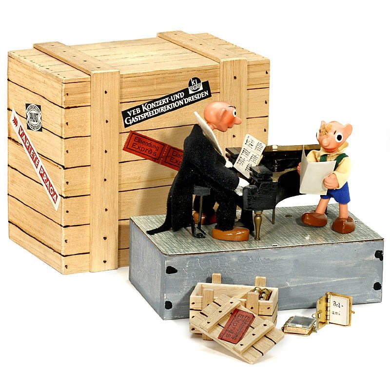 Musical Automaton "The Piano Player", c. 1960: Musical Automaton "The Piano Player", c. 1960 Manufactured by "H. Paufler", wooden and rubber figures, dressed in felt, base containing musical movement. The pianist moves to the sides and plays his h