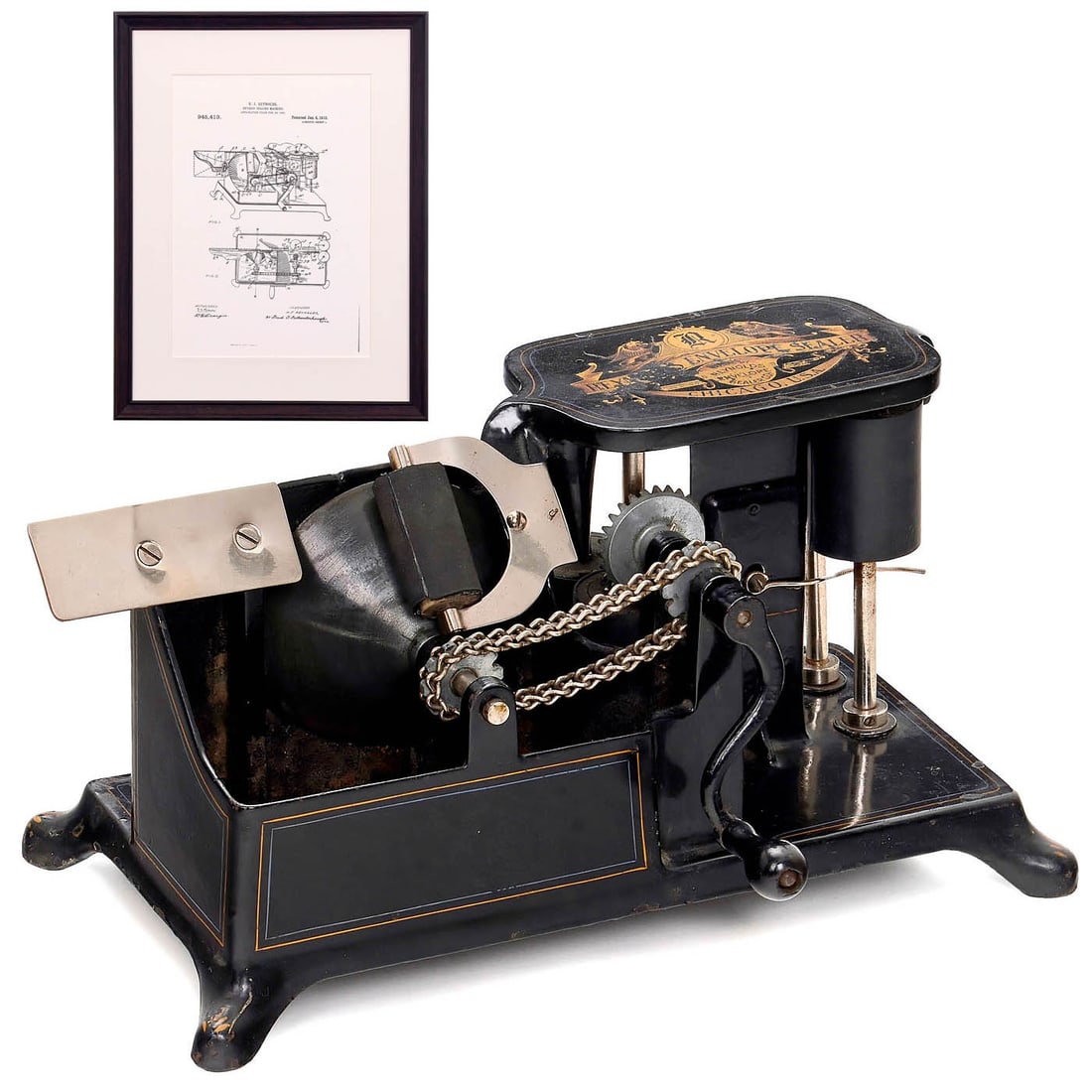 Reynolds Envelope Sealer, c. 1920: Reynolds Envelope Sealer, c. 1920 Manufactured by C.H. Reynolds, Chicago, IL. Black lacquered cast iron, nice golden decoration, handcranked, working, with framed copy of the patent drawing from 1910.
