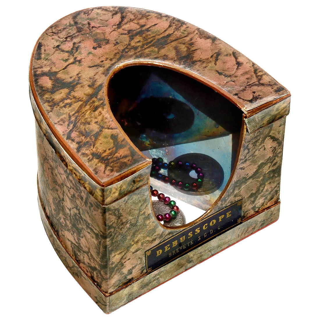 Debusskop, c. 1870: Debusskop, c. 1870 Johann Wilhelm Debus, Darmstadt. Further development of the kaleidoscope, patented on 24 October 1859, for creating diverse patterns from simple objects (e.g. parts of flowers, spla