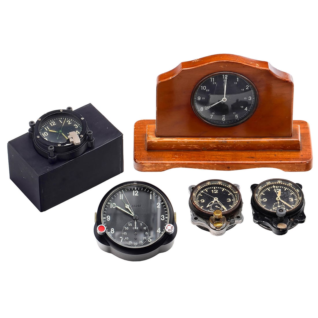 5 Mechanical Cockpit Clocks: 5 Mechanical Cockpit Clocks 1) Poljot 3133, USSR, Ø 3 1/6 in., with bracket, in working order. – 2) Cockpit clock from a car or aeroplane, c. 1930, Ø 3 in., on wooden base,