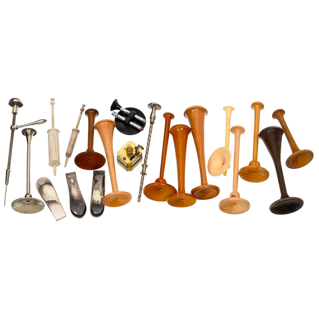 Collection of Medical Devices and Aids: Collection of Medical Devices and Aids 1) 11 stethoscopes, c. 1920, various materials, wood (cherry, beech, pear), bakelite, early plastic and metal, some can be dismantled for transport. –